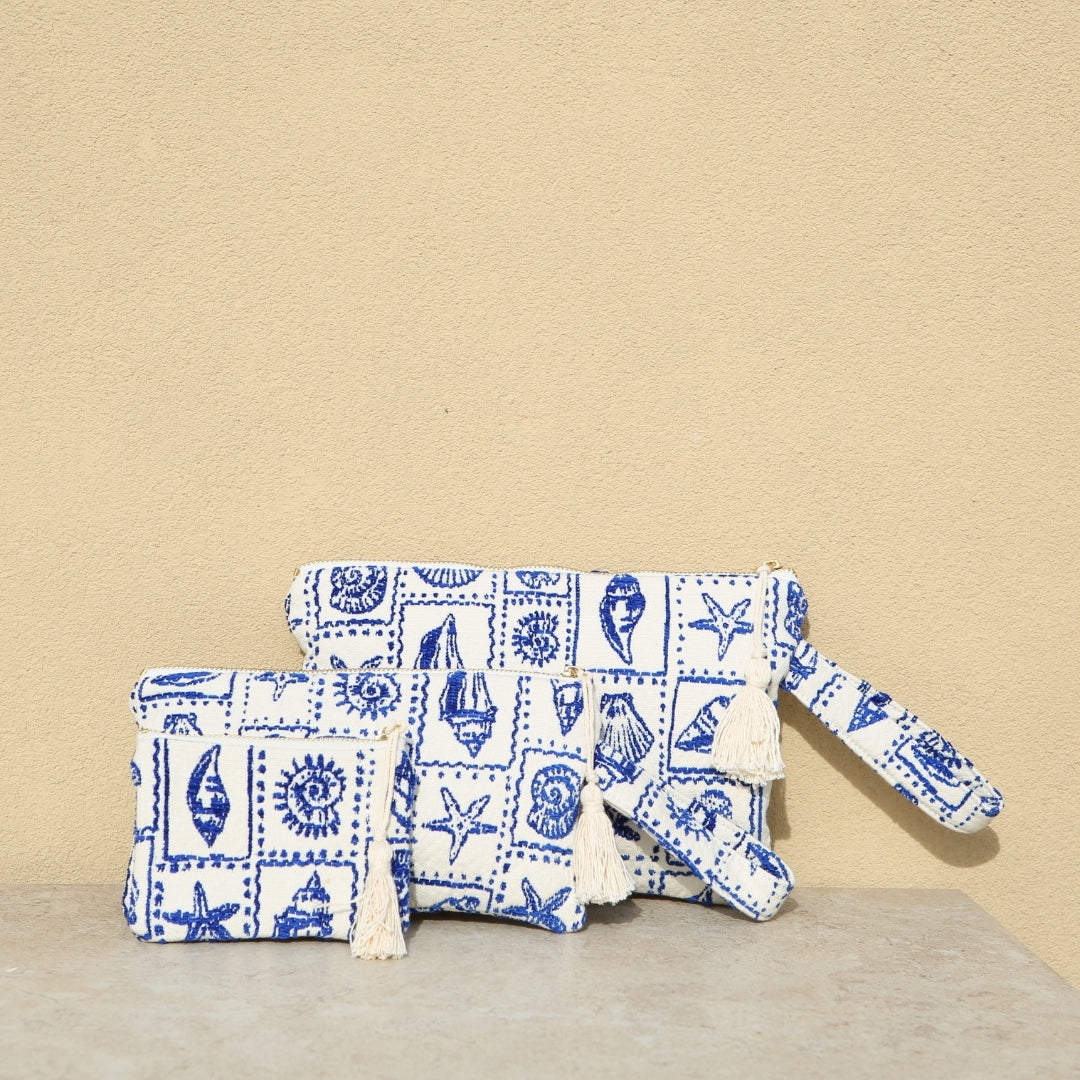 Marabu seashell clutch small and large — blue seashell print on natural cotton, tassel zip, handmade in Greece