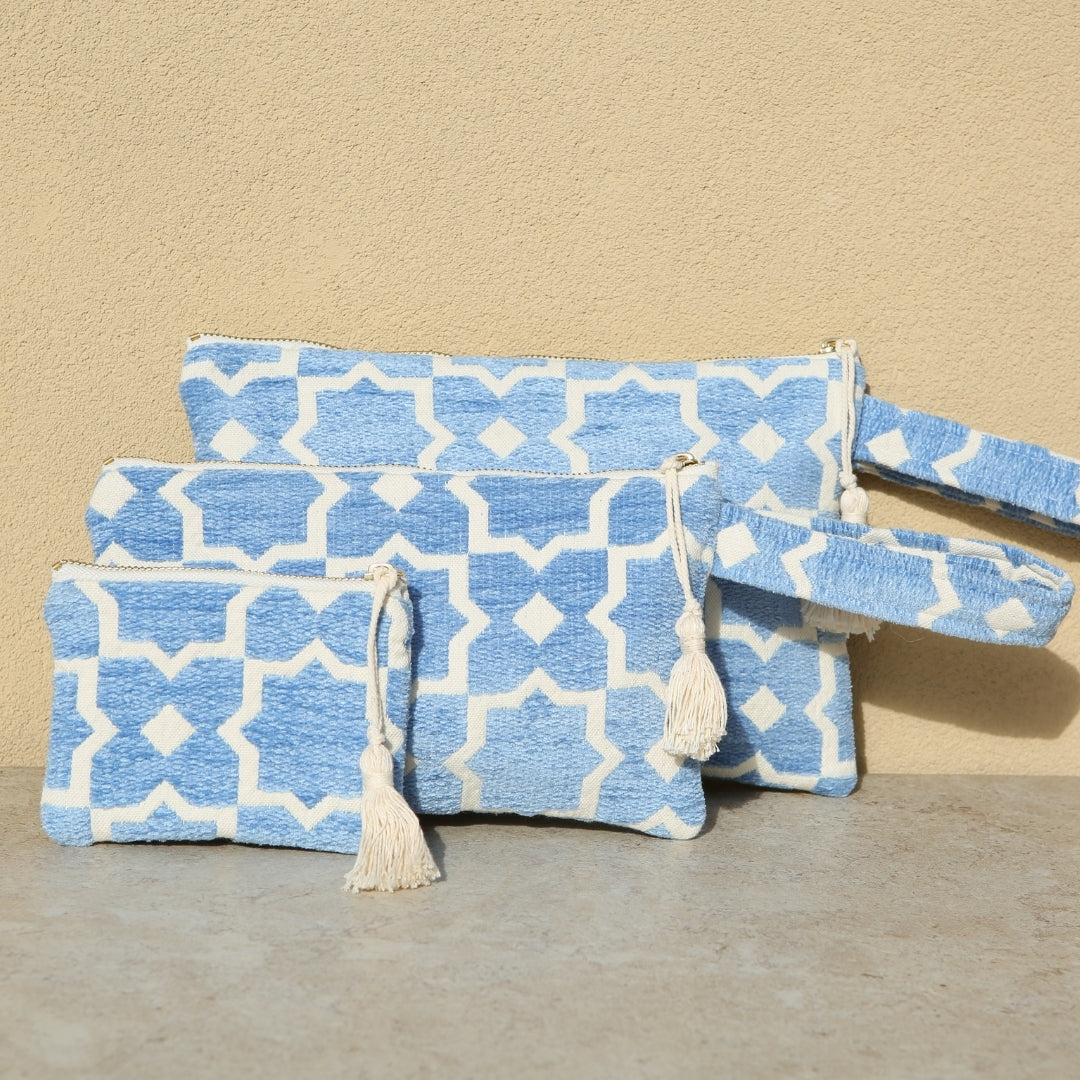 Marabu star clutch in light blue — geometric star print on natural cotton canvas, three sizes, made in Greece