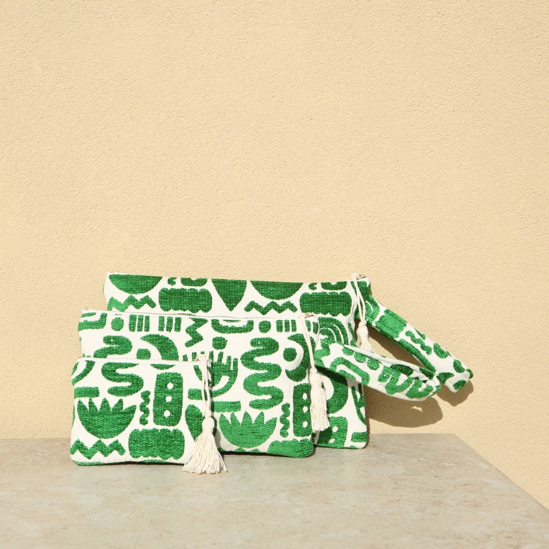 Marabu symbols clutch in green — bold abstract Greek symbols on natural cotton, tassel zip, handmade in Greece
