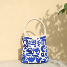 Marabu bucket bag in deep blue Symbols print — bold Greek-inspired embroidery on natural cotton canvas, made in Greece
