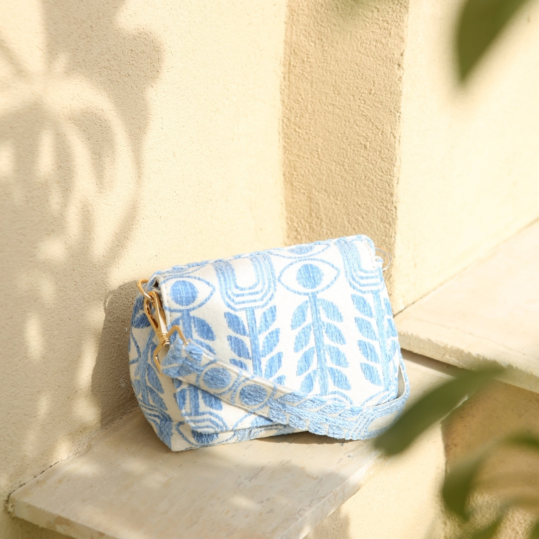 Marabu crossbody bag in light blue Unity print — natural cotton, gold hardware, adjustable strap, handmade in Greece