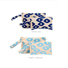 Marabu fish eye clutch colour options — deep blue and turquoise fish eye print on natural cotton canvas