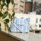 Marabu flap bag in light blue Unity print — natural cotton, flap closure, gold hardware, handmade in Greece