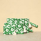 Marabu flower clutch in green — bold floral print on natural cotton, tassel zip, handmade in Greece