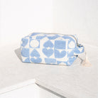 Marabu makeup bag in blue Heart print — natural cotton canvas, gold zip with tassel, handmade in Greece