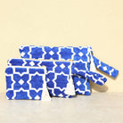 Marabu star clutch in x-small, small and big — blue Greek star print on natural cotton, tassel zip, handmade in Greece